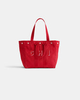 The Perfect Weekday Tote: a large red personalized bag with two handles, silver studs on the top edge, and 