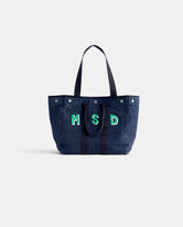 The Perfect Weekday Tote is a navy blue cotton bag with two handles, 